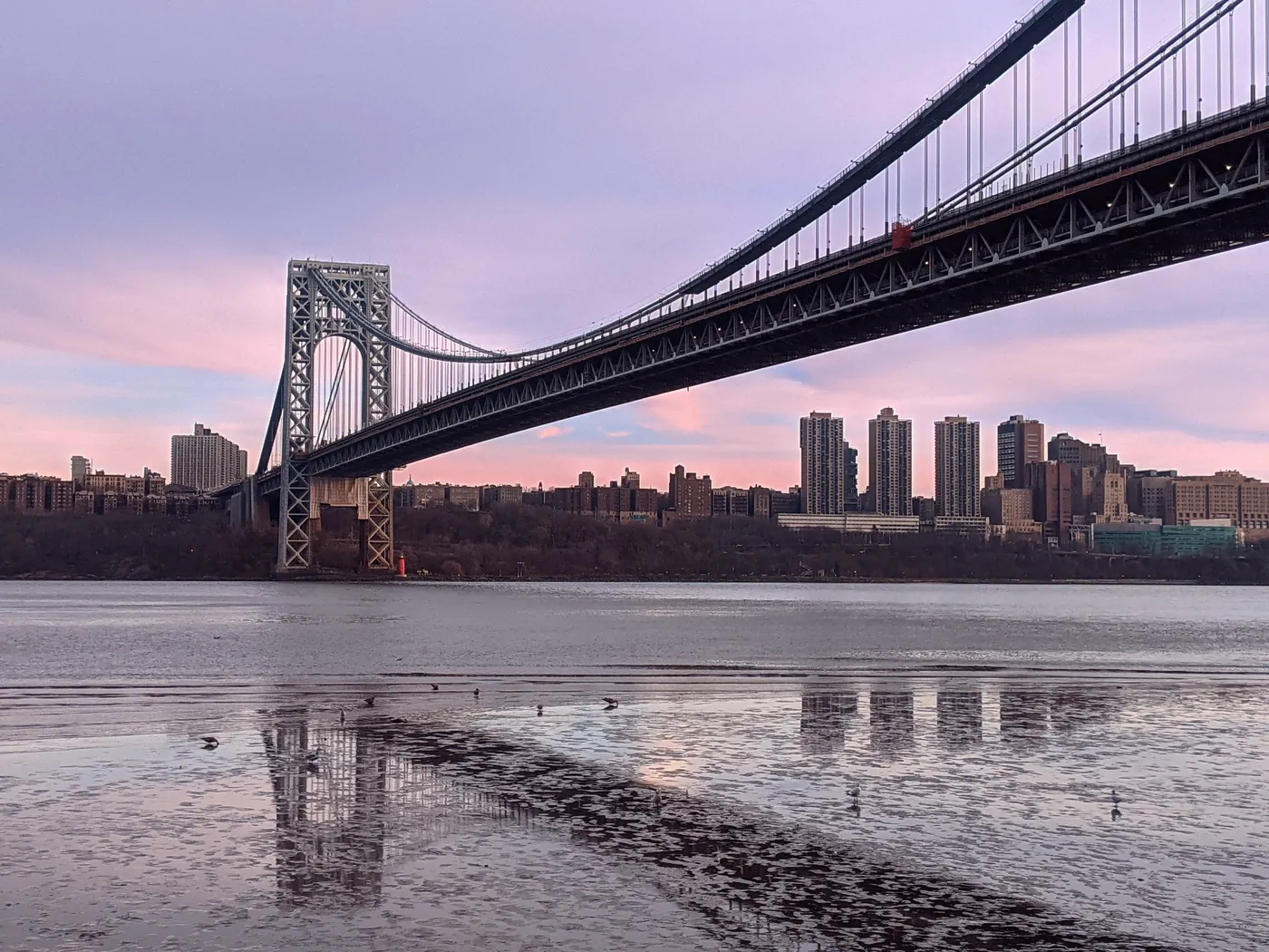 The George Washington Bridge at dusk, seen from the Fort Lee shoreline