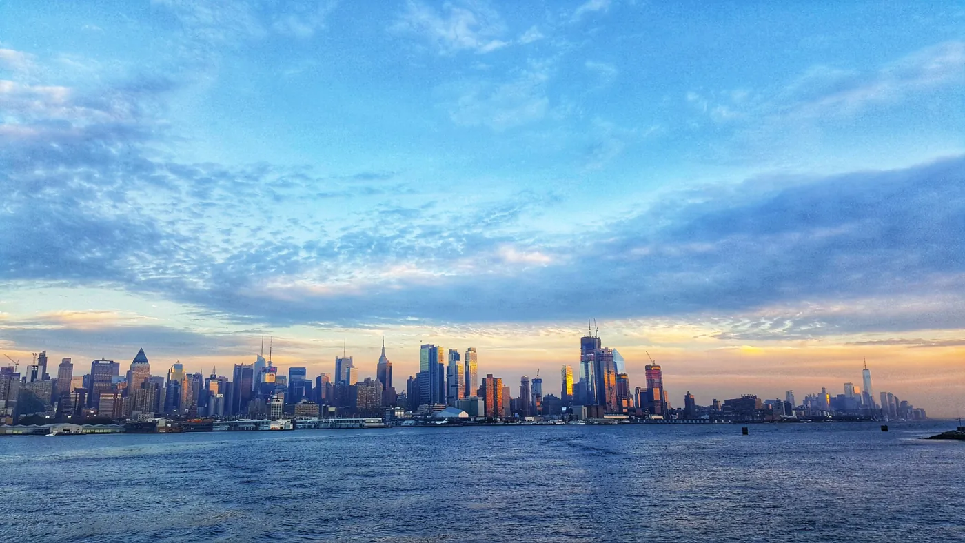 The Manhattan skyline at sunset across the Hudson River, seen from Weehawken